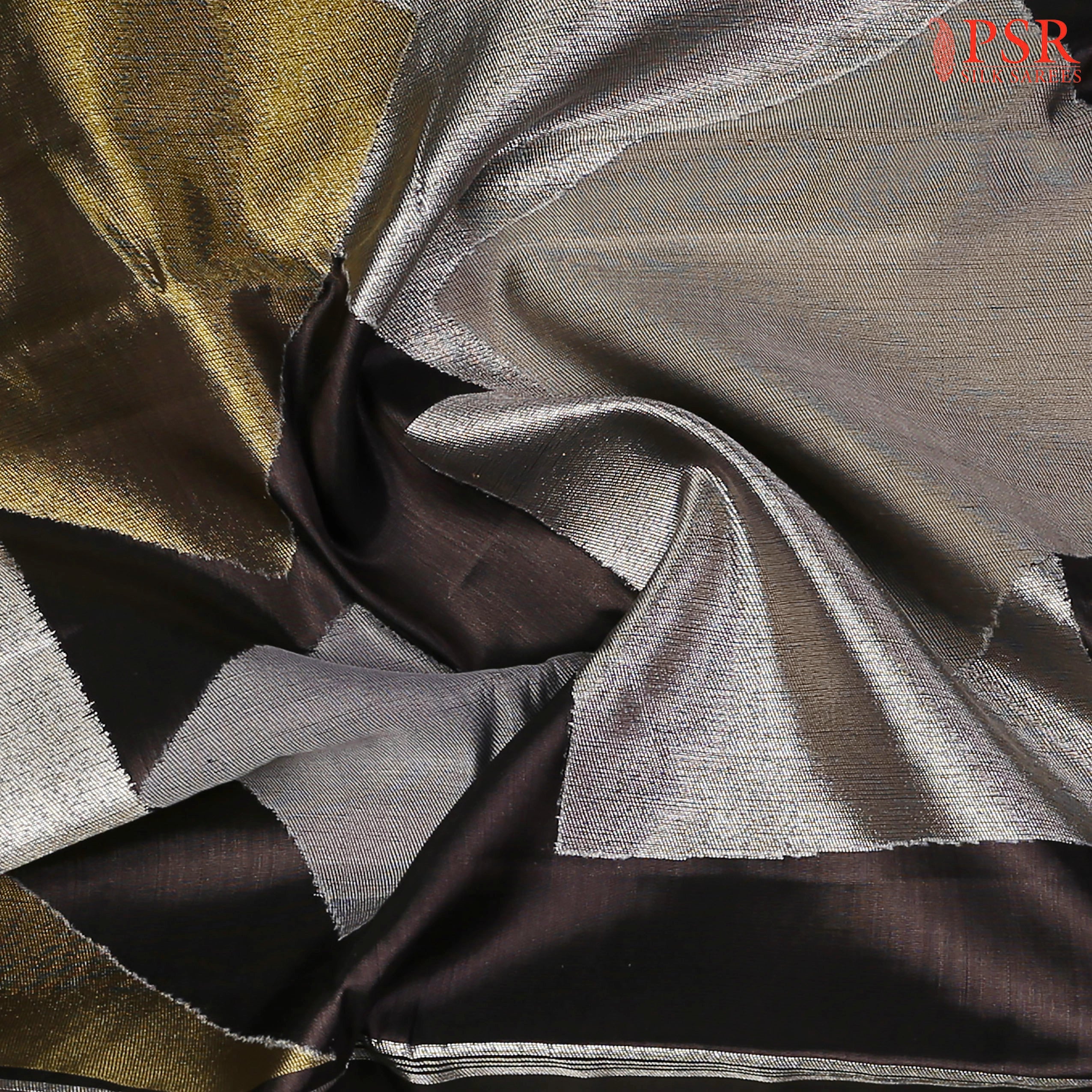 Exquisite silver zari detailing on premium Kanchipuram silk fabric