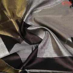 Exquisite silver zari detailing on premium Kanchipuram silk fabric