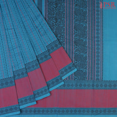 PSR Silks presents a traditionsal handloom Kalakshetra Kovai Cotton saree in a captivating Cerulean Blue, beautifully weaved pink & black thread work.