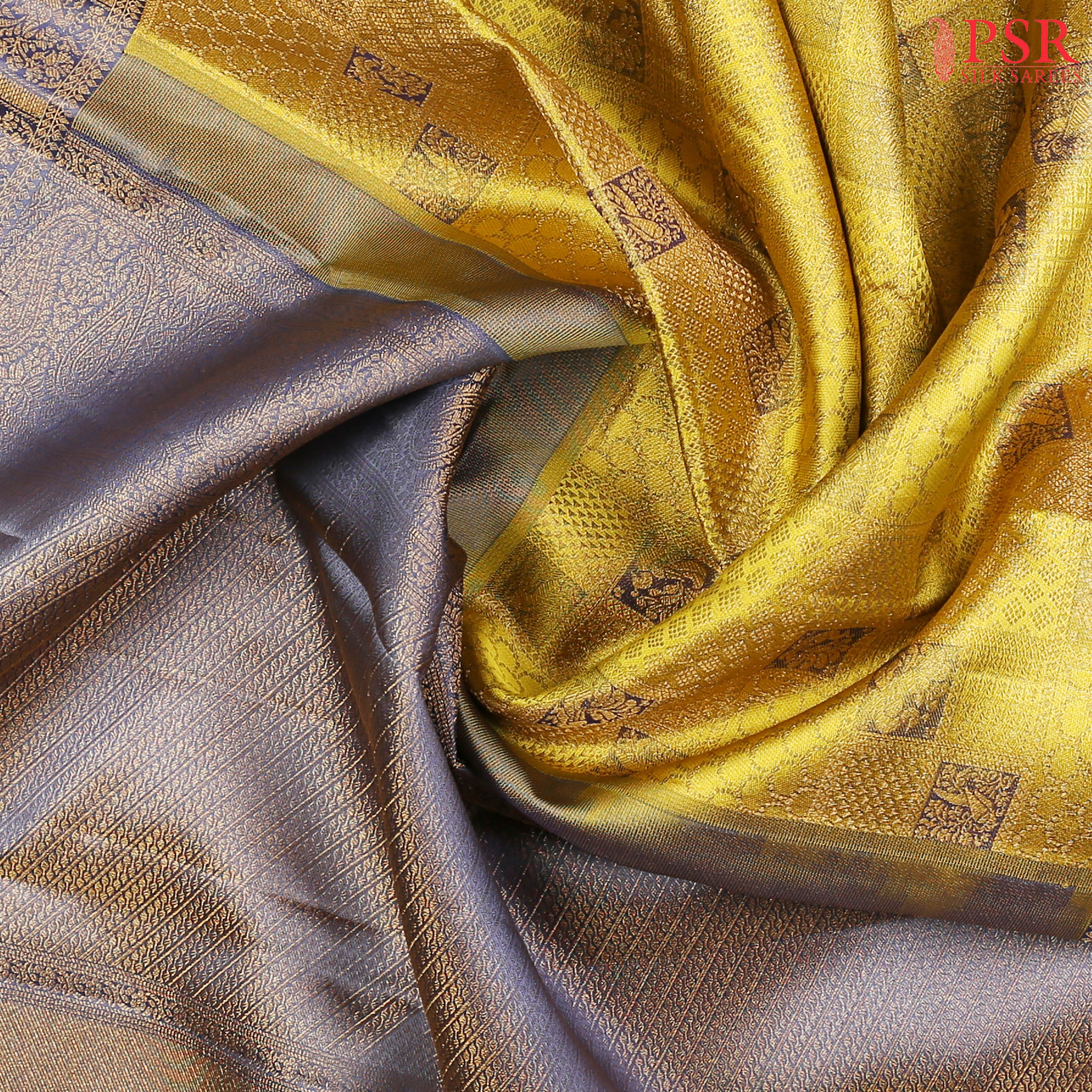 his Citrus Yellow & Dark Steel Blue Kanchipuram Silk Saree from PSR Silk Sarees is a radiant addition to the "Vaichitrya Kanjivaram" collection