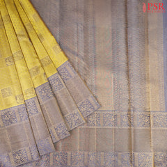his Citrus Yellow & Dark Steel Blue Kanchipuram Silk Saree from PSR Silk Sarees is a radiant addition to the "Vaichitrya Kanjivaram" collection