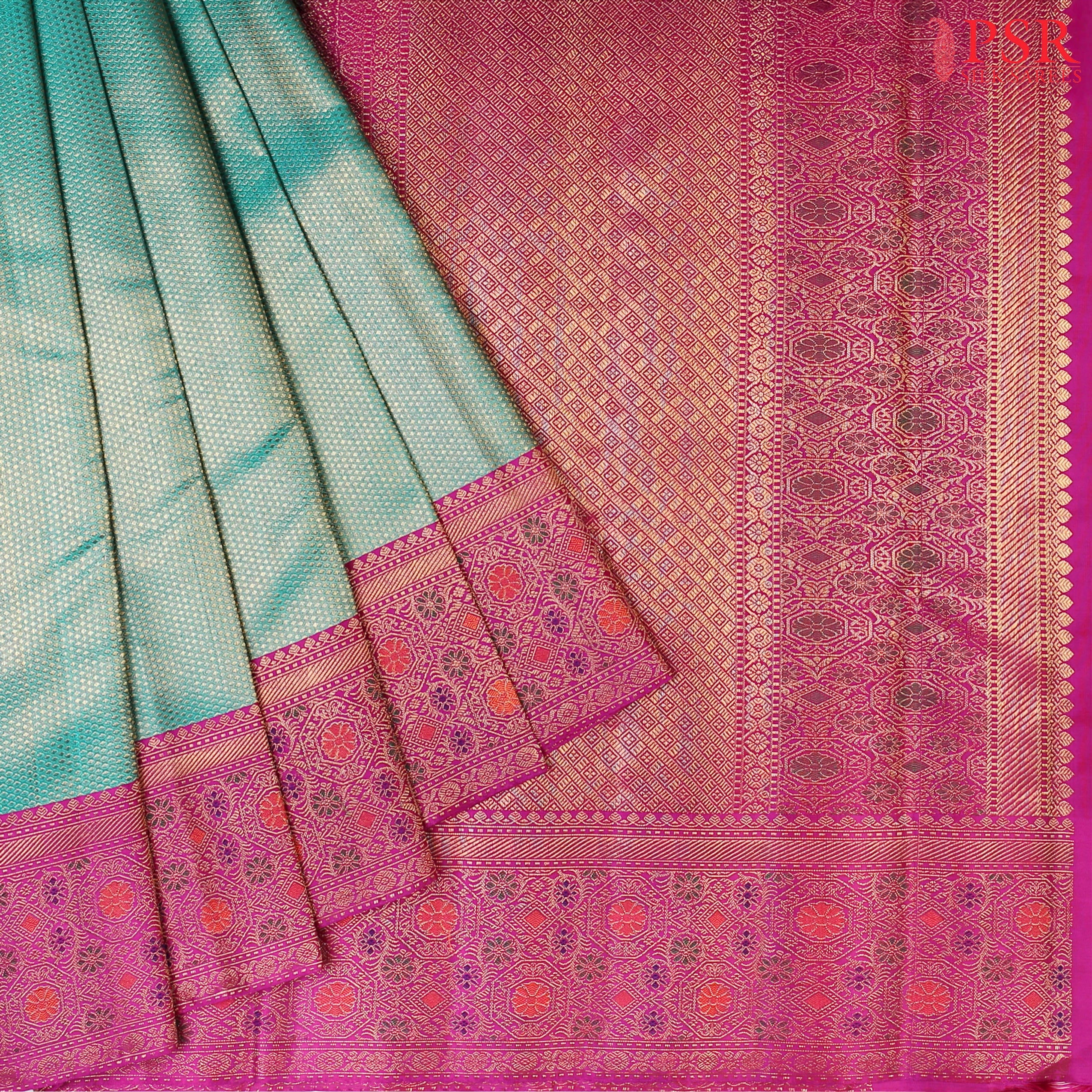 Dark Cyan Bridal Kanchipuram Silk Saree with golden dots pattern and contrasting Vadamalli Purple border