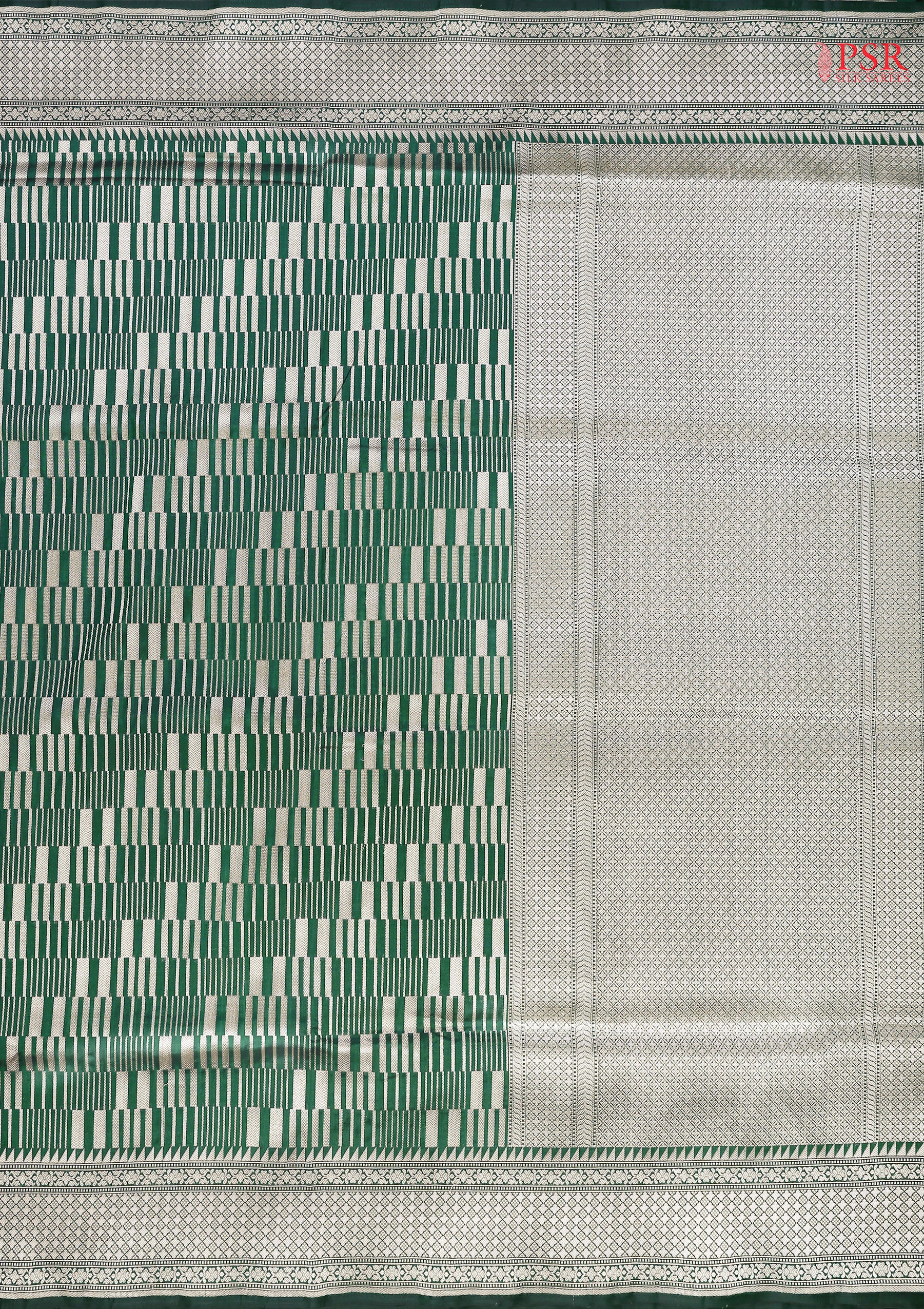 PSR Silk Sarees presents an elegant Dark Green Banaras Silk Saree, a masterpiece of heritage and craftsmanship.