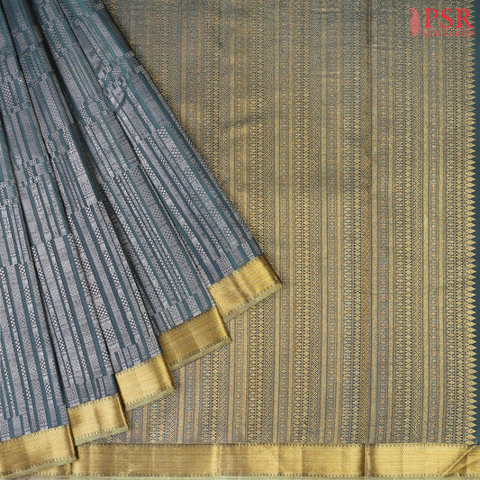 This Dark Teal & Olive Grey Kanchipuram Silk Saree from PSR Silk Sarees is a timeless masterpiece from the "Vaichitrya Kanjivaram" collection.