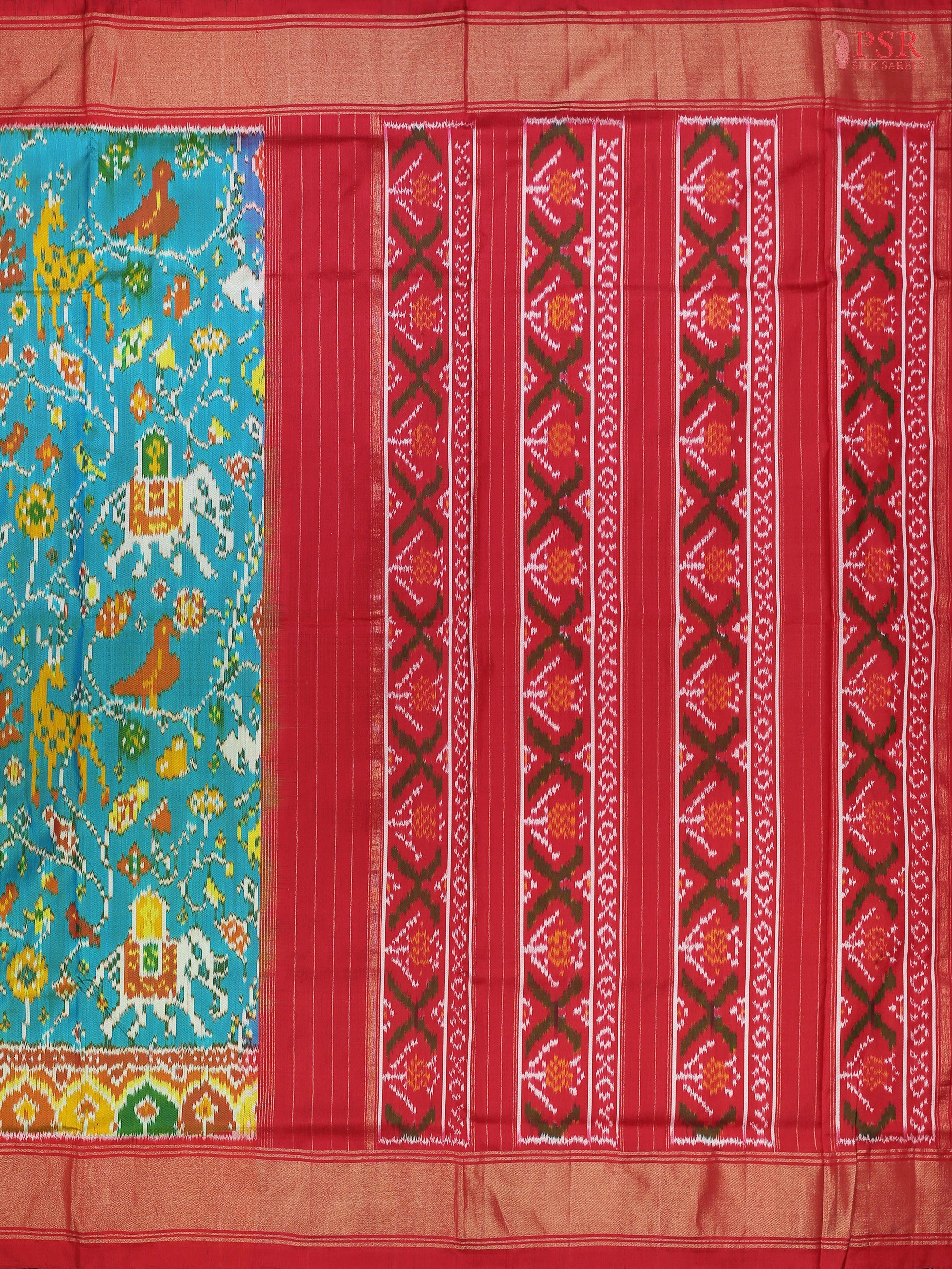 This Dark Turquoise & Red Pochampally Silk Saree from PSR Silk Sarees is a stunning embodiment of heritage and vibrance