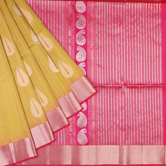 PSR Silk Sarees presents a Flaxen Yellow Soft Tissue Silk Saree, paired beautifully with a Magenta Pink combination.