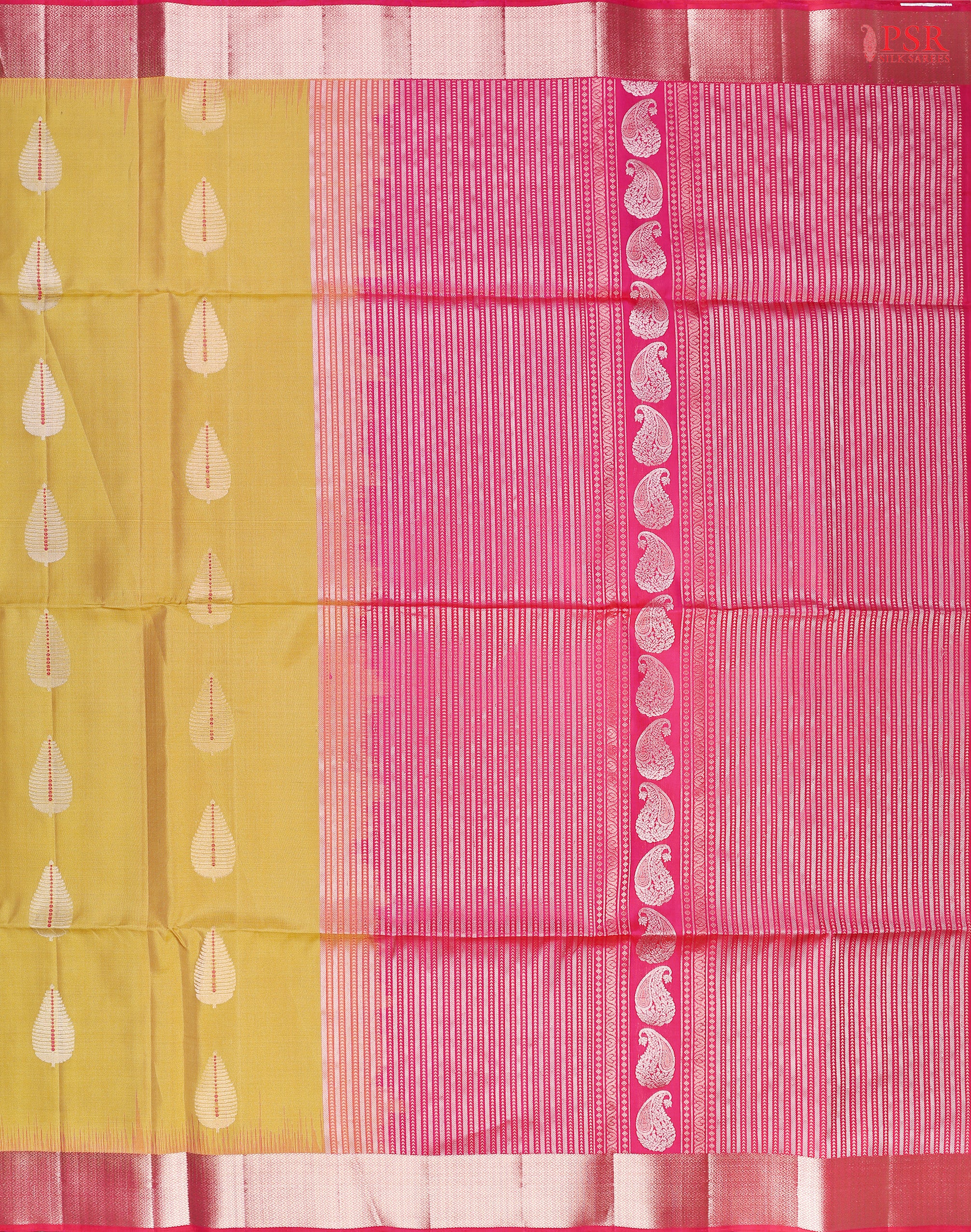 PSR Silk Sarees presents a Flaxen Yellow Soft Tissue Silk Saree, paired beautifully with a Magenta Pink combination.