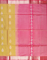 PSR Silk Sarees presents a Flaxen Yellow Soft Tissue Silk Saree, paired beautifully with a Magenta Pink combination.