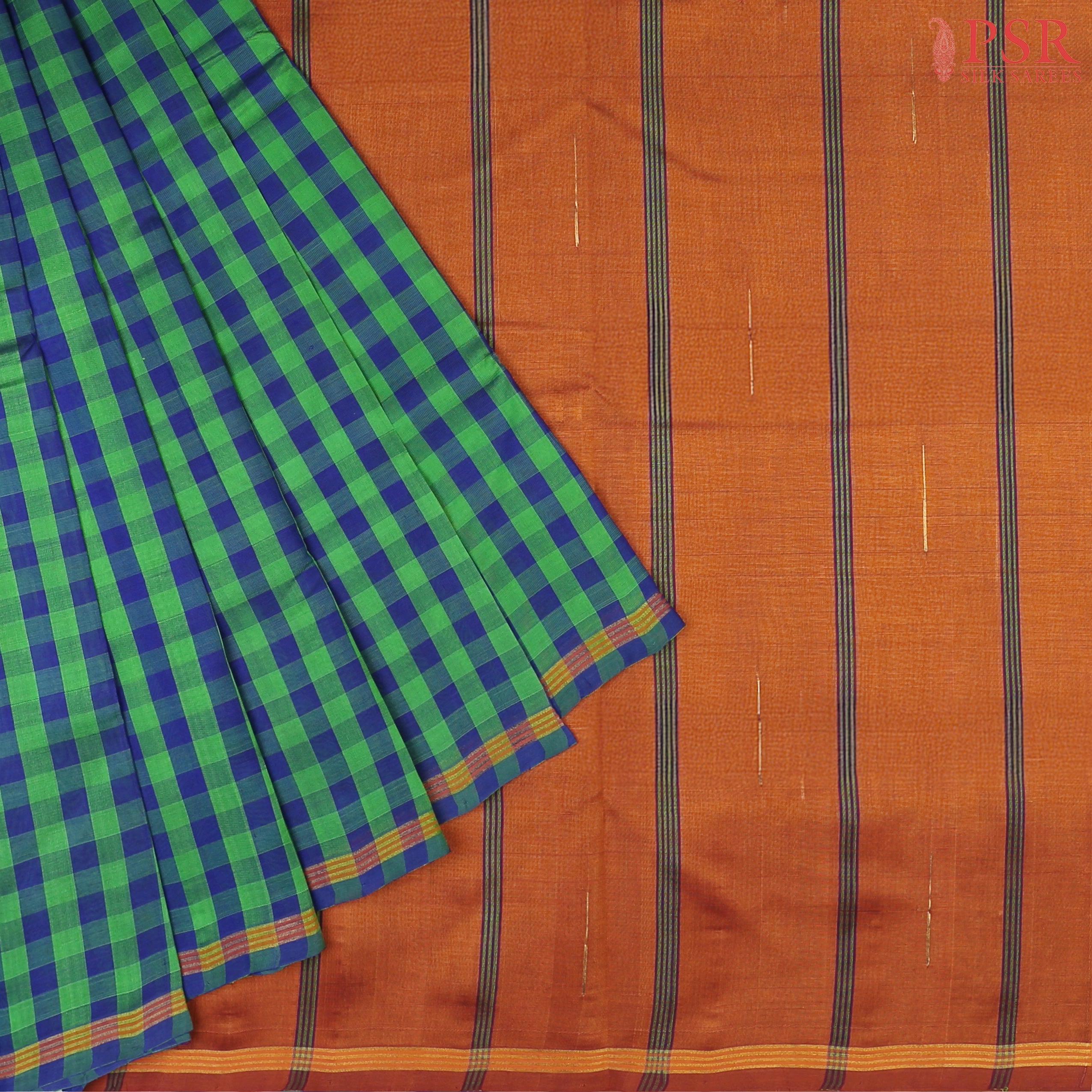 Green & Blue Cotton Silk Saree with checkered pattern, Burnt Orange pallu featuring stripes & Malli Moggu zari motifs, paired with a matching blouse.