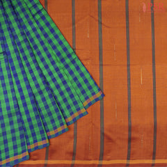 Green & Blue Cotton Silk Saree with checkered pattern, Burnt Orange pallu featuring stripes & Malli Moggu zari motifs, paired with a matching blouse.