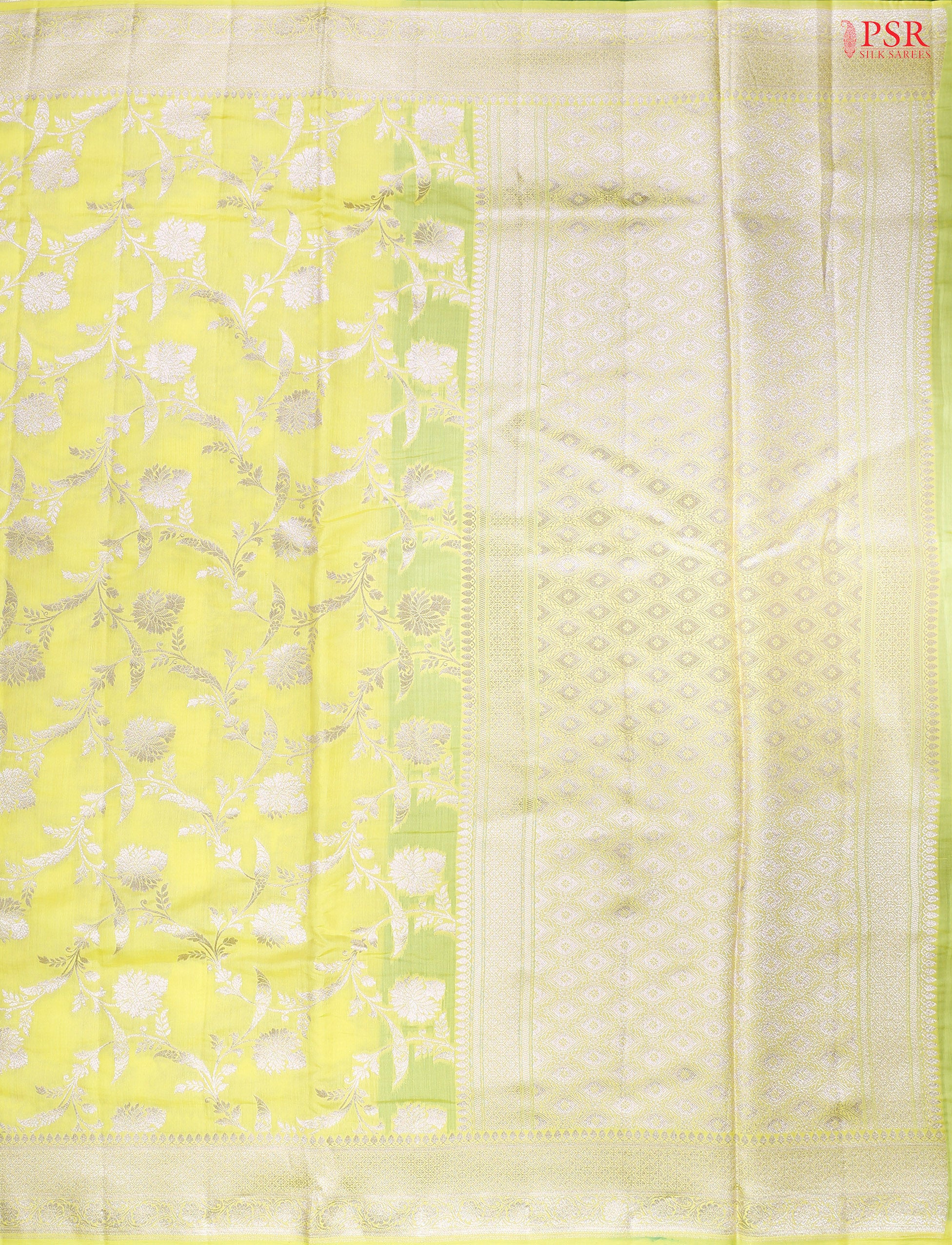 Brighten up your wardrobe with our Lemon Yellow Chiniya Silk Saree, beautifully contrasted with Dark Green accents.