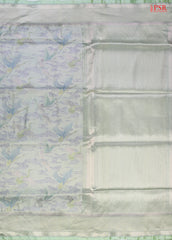 PSR Silk Sarees presents an exquisite & Light Mint Green Pashmina Tissue Silk Saree, a perfect blend of grace and tradition