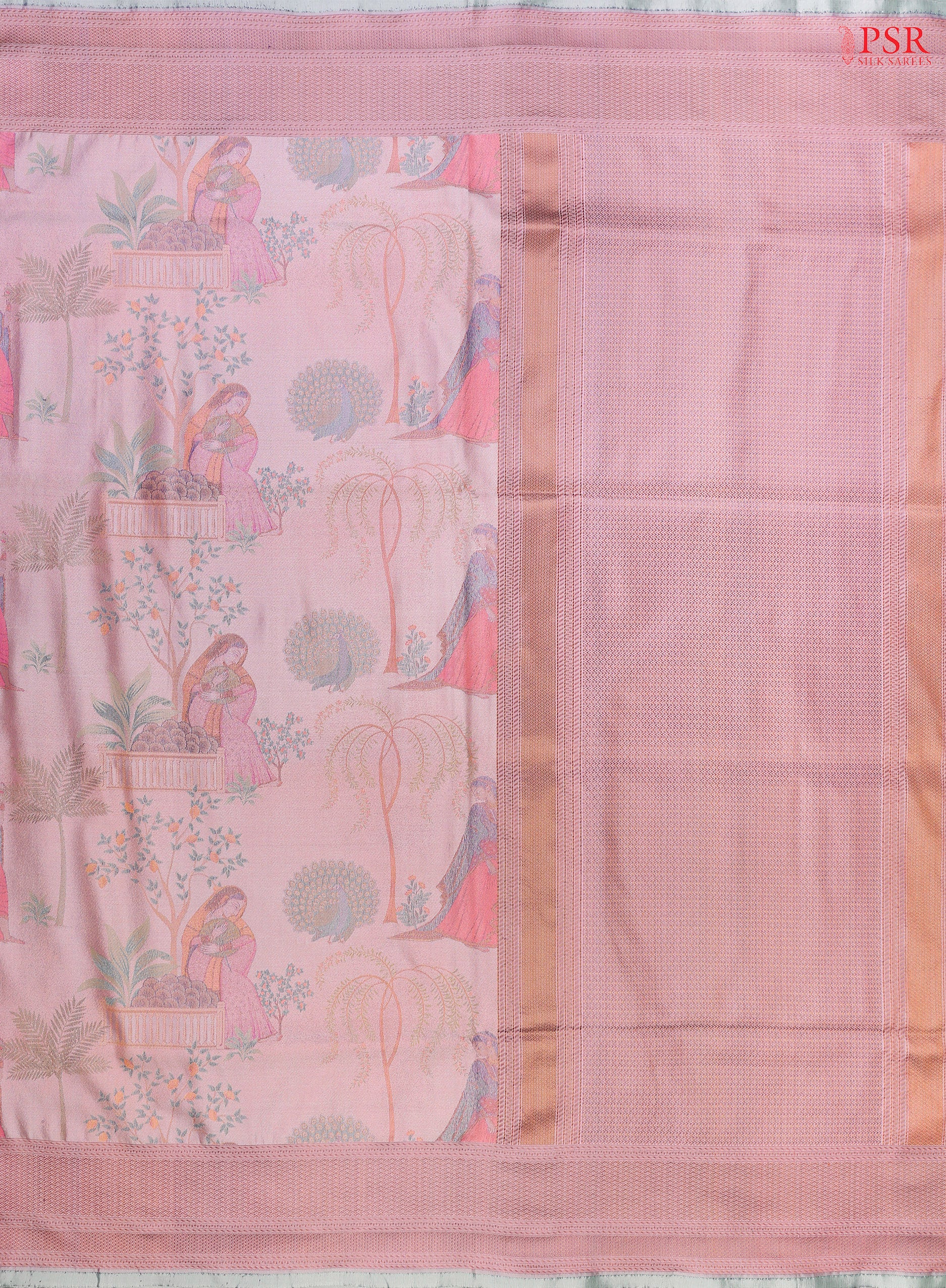 PSR Silk Sarees presents a stunning Light Pink Mauve Pashmina Silk Saree, a perfect blend of luxury and heritage