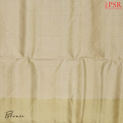 Introducing our stunning Mauve Purple Soft Silk Saree, beautifully paired with a soothing Light Olive hue. This graceful saree features small zari checks and a vibrant tri-color stripe pattern in Mauve Purple, Green, and Dark Blue, adding a unique touch of charm and style.