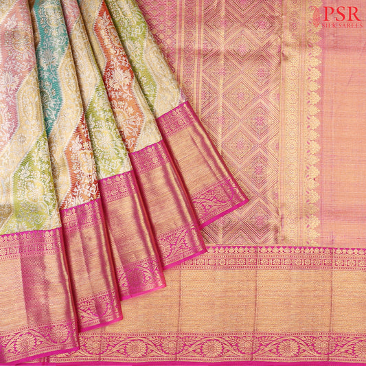 Multicolored Kanchipuram Tissue Silk Saree with a zig-zag pattern and rich floral zari work.