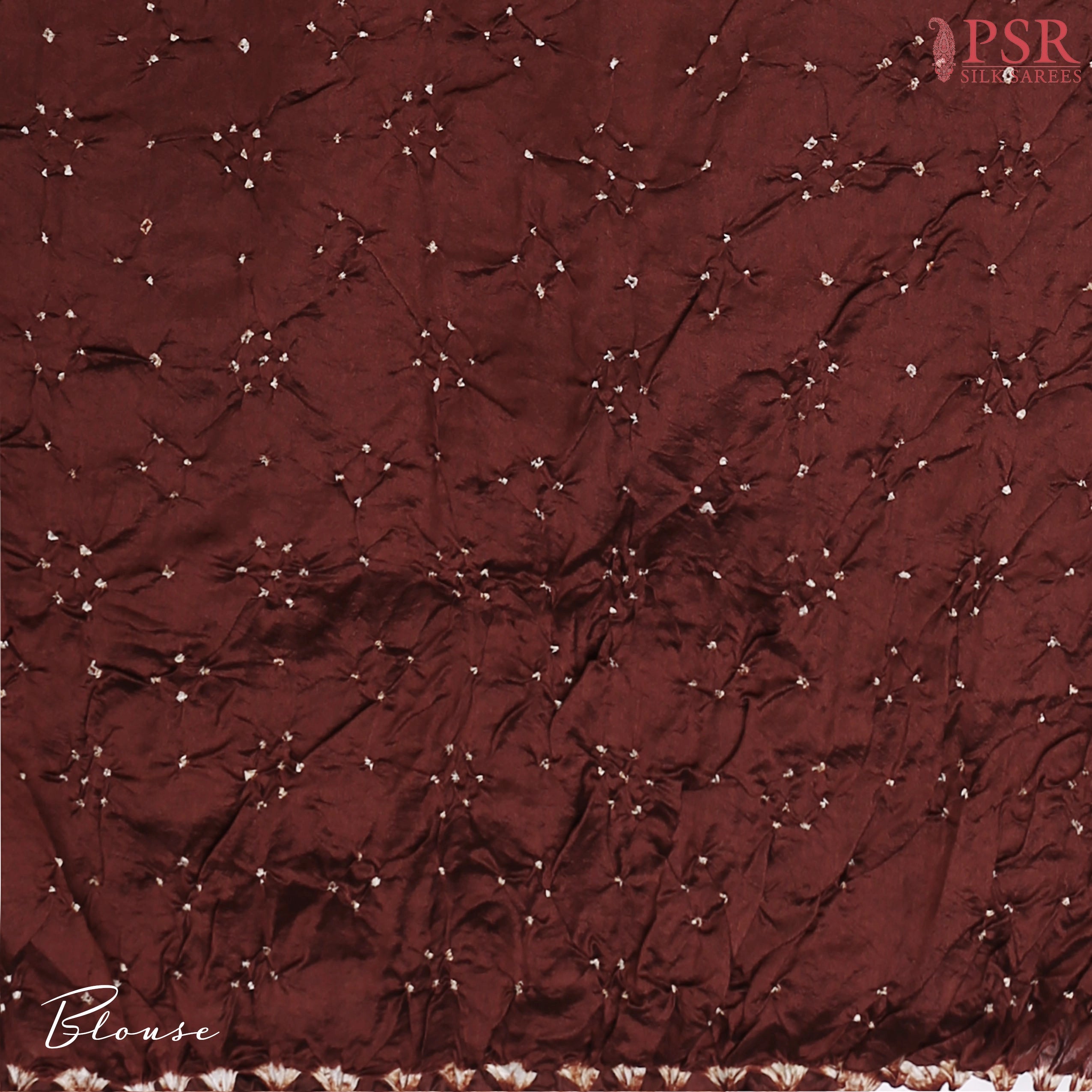 Matching Mahogany Brown Bandhini blouse, complementing the saree’s rich aesthetics