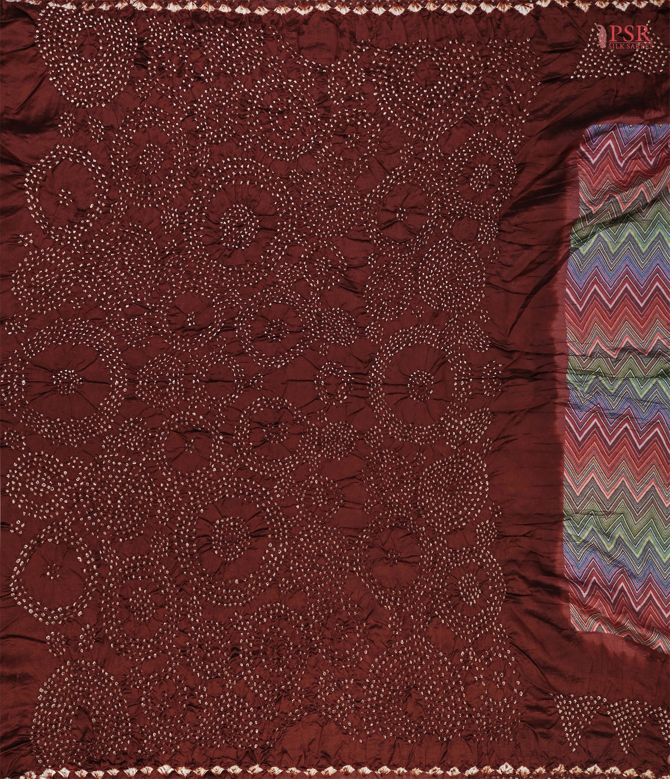 Mahogany Brown Bandhini pallu with traditional motifs