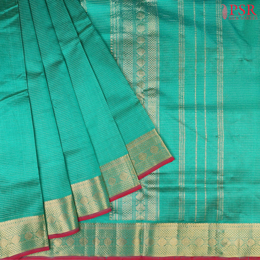 Persian Green Cotton Silk Saree with horizontal zari stripes, zari chit pallu, elegant zari border, and a matching running blouse