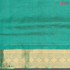Persian Green Cotton Silk Saree with horizontal zari stripes, zari chit pallu, elegant zari border, and a matching running blouse