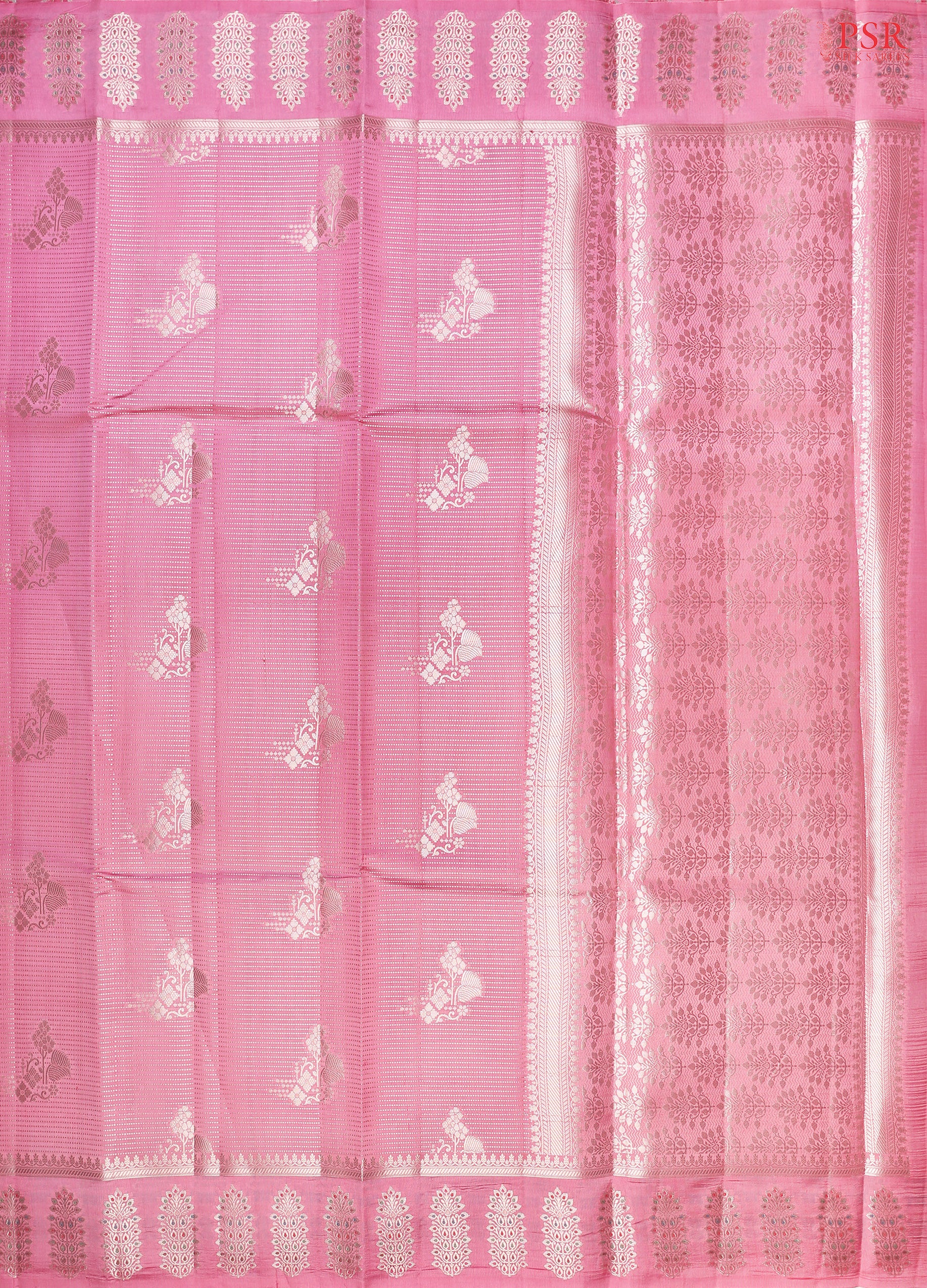 Elevate your elegance with our Pink Chiniya Silk Saree, a blend of timeless tradition and modern sophistication.