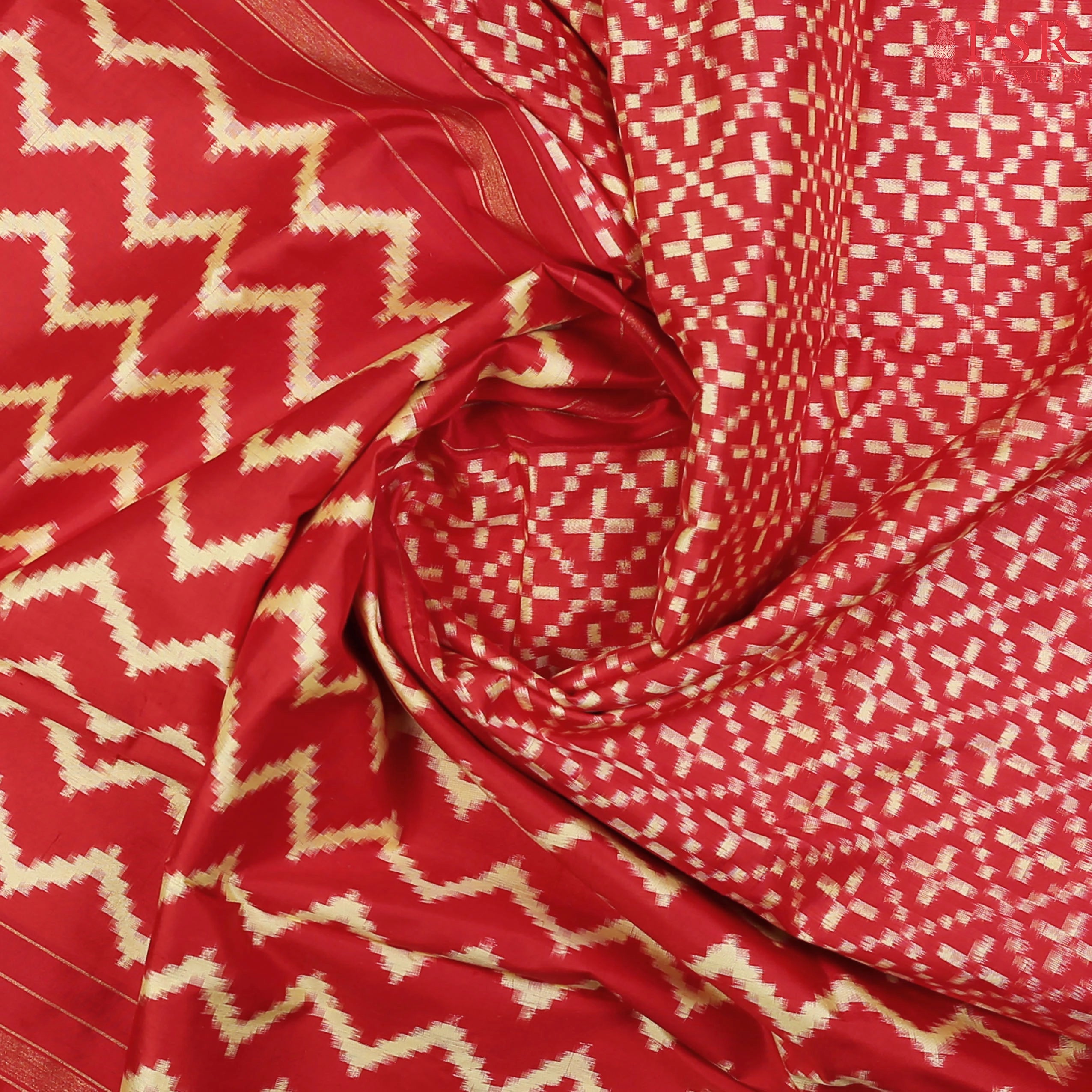 PSR Silks brings you a breathtaking Red & Cream Yellow Pochampally Ikkat Silk Saree.