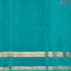 Step into elegance with PSR Silks' captivating Tyrian Purple Mysore Silk saree, paired with a striking Turquoise Cyan combination!