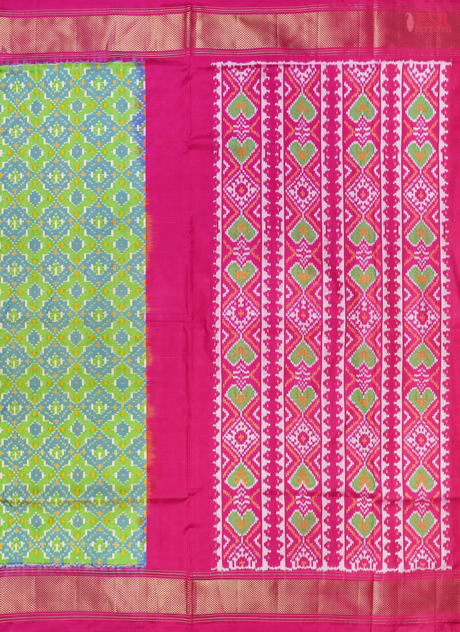 This Parrot Green & Magenta Pink Pochampally Silk Saree from PSR Silk Sarees is a stunning embodiment of heritage and vibrance.