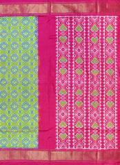 This Parrot Green & Magenta Pink Pochampally Silk Saree from PSR Silk Sarees is a stunning embodiment of heritage and vibrance.