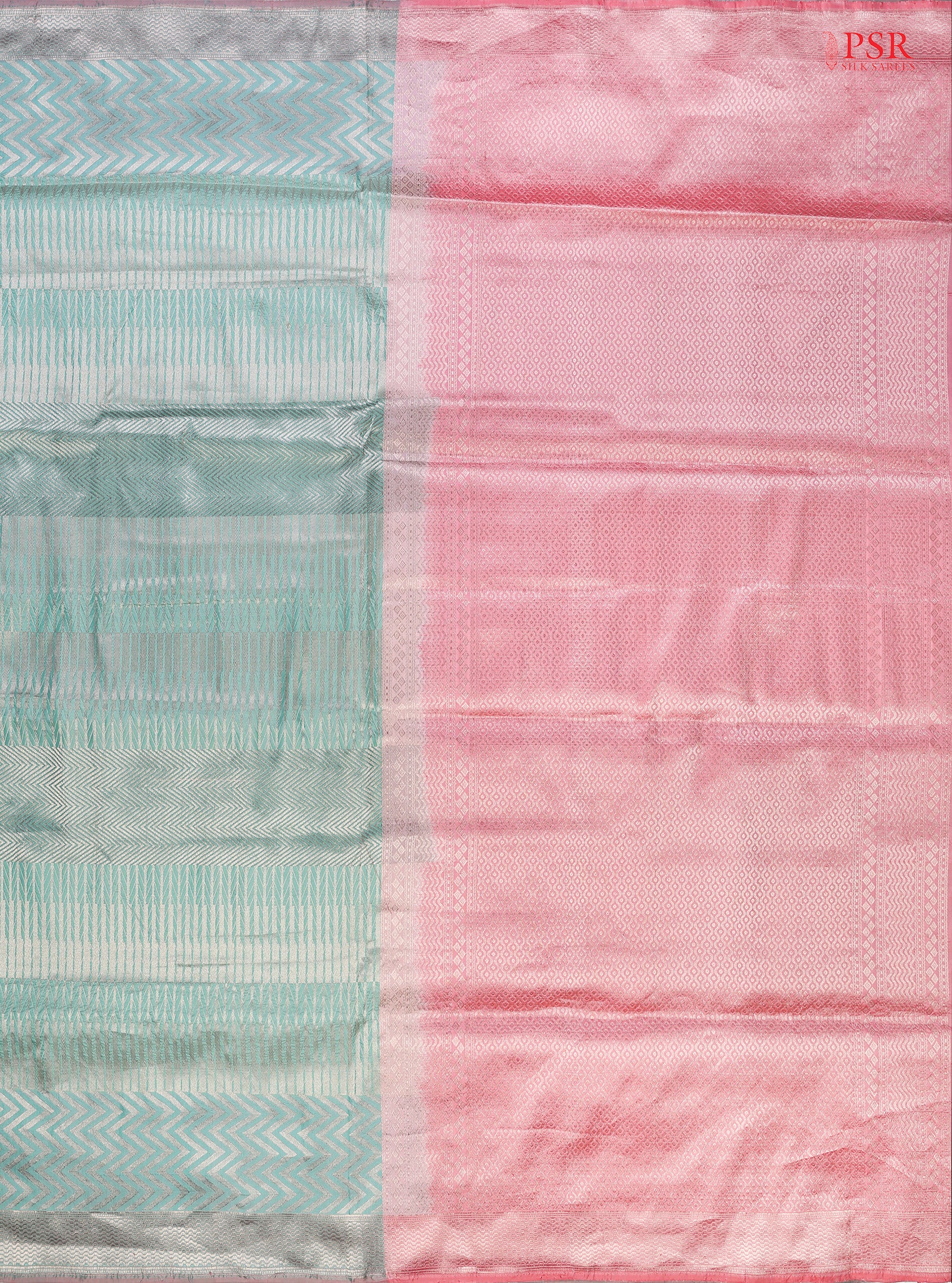 PSR Silk Sarees presents an elegant Aqua Pearl&nbsp;Banaras Silk Saree, a masterpiece of heritage and craftsmanship.
