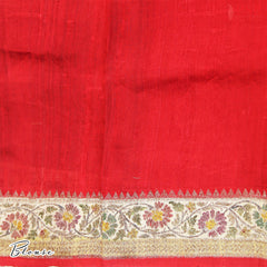 PSR Silks&nbsp;presents a voguish Black colored Banaras Jute Silk saree with combination of Red color