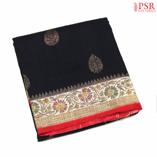 PSR Silks&nbsp;presents a voguish Black colored Banaras Jute Silk saree with combination of Red color