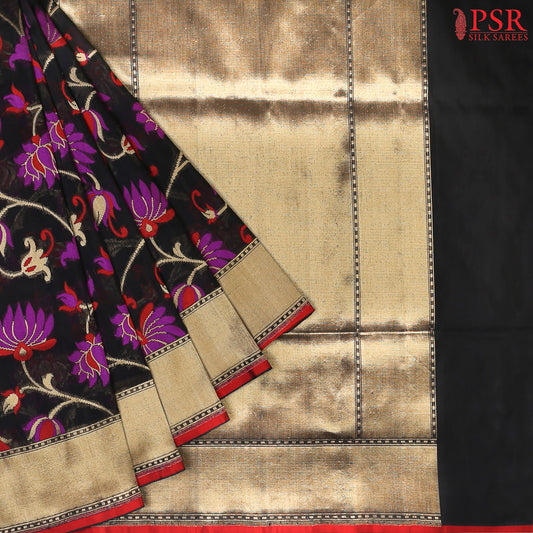 PSR Silks presents a breathtaking Black Banarasi Silk saree, a true embodiment of grace and sophistication.