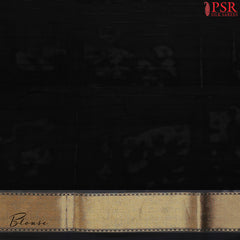 PSR Silks presents a breathtaking Black Banarasi Silk saree, a true embodiment of grace and sophistication.