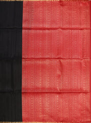 Black Jute Soft Silk Saree with golden zari work, rich Red pallu, and matching designer blouse with zari detailing