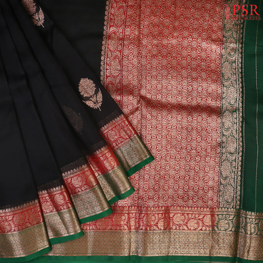 Wrap yourself in timeless sophistication with our exquisite Black Kora Banaras Silk Saree. 