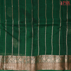 Wrap yourself in timeless sophistication with our exquisite Black Kora Banaras Silk Saree. 