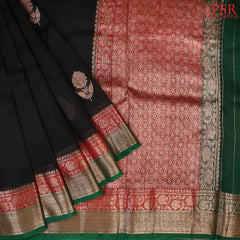 Wrap yourself in timeless sophistication with our exquisite Black Kora Banaras Silk Saree. 