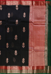 Wrap yourself in timeless sophistication with our exquisite Black Kora Banaras Silk Saree. 