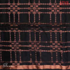 Indulge in timeless elegance with our Black&nbsp;Soft Silk Saree, crafted to perfection with&nbsp;impressive copper zari jacquard stripes patterm.