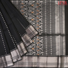 Embrace the charm of classic beauty with our Black Soft Silk Saree, a masterpiece designed to make a statement at every occasion.