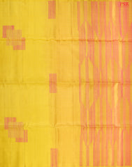 This exquisite Soft Silk saree in a soft Canary Yellow hue is beautifully contrasted with vibrant Flamingo Pink accents