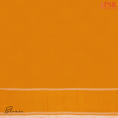Plain Marigold Yellow blouse, complementing the saree’s vibrant contrast.