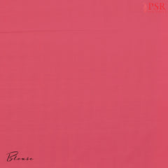 Plain Pink blouse, complementing the saree’s vibrant appeal.
