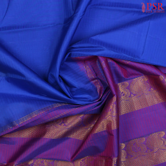 PSR Silks presents a Cobalt Blue colored Arani Silk saree with combination of Puple color.&nbsp;