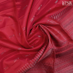 PSR Silk Sarees presents a Crimson Red Soft Silk Saree, a timeless masterpiece