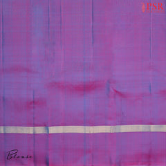 Step into regal sophistication with our Cyan Soft Silk Saree, exquisitely paired with a rich Purple contrast. 