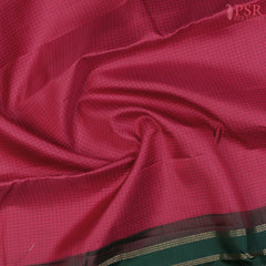 PSR Silks presents a Dark Cerise Pink Fancy Kanchipuram Silk Saree, elegantly paired with a striking Dark Green combination. A timeless blend of tradition and grace!