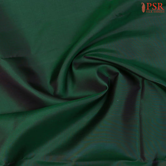 Traditional zari work on Kanchipuram Silk saree.