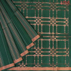 Indulge in timeless elegance with our Dark Green&nbsp;Soft Silk Saree, crafted to perfection with&nbsp;impressive copper zari jacquard stripes patterm.