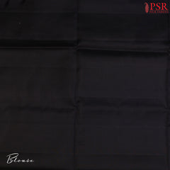 Step into a world of refined beauty with our Dark Green Soft Silk Saree, elegantly paired with a classic Black combination. 